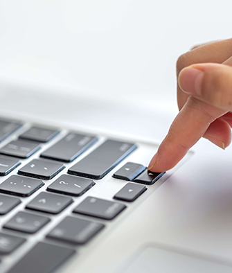 person-pressing-keyboard-key