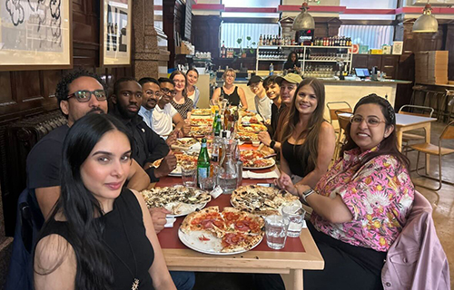 Emrise team at restaurant table