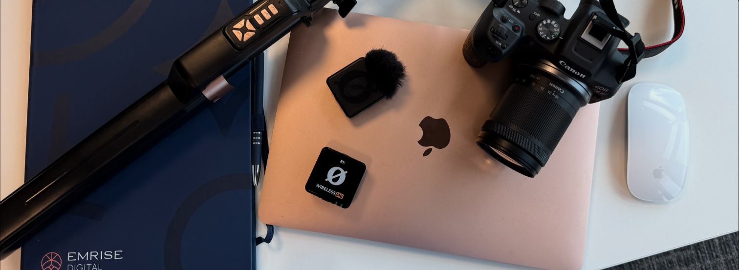 Laptop,-camera,-mic-and-tripod-laid-out-on-table