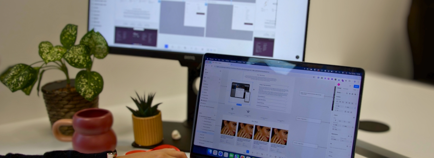 Laptop-and-computer-screen-showing-website-design-process