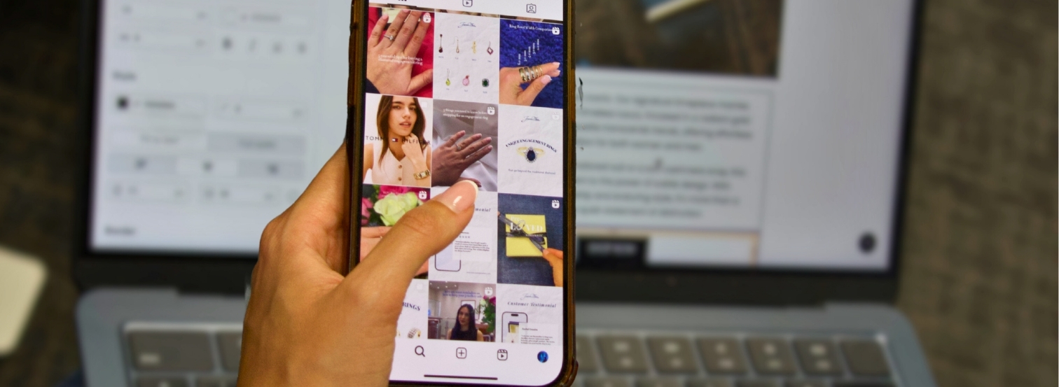 Person-holding-phone-with-an-Instagram-feed-open
