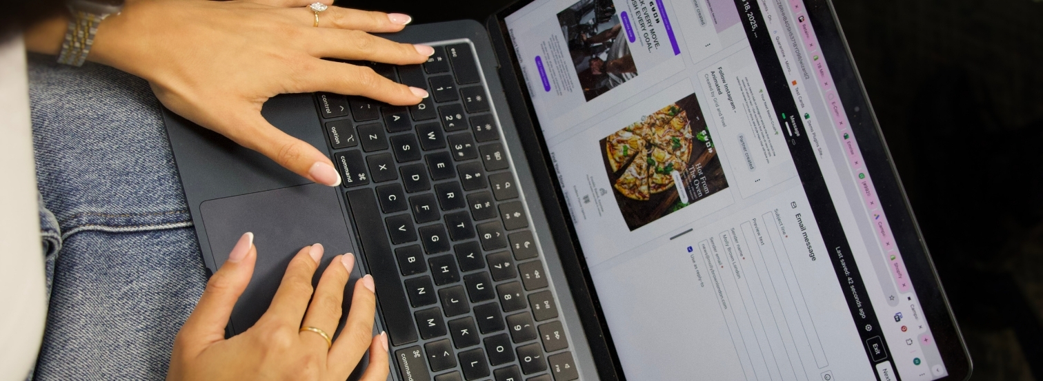 Person-creating-an-email-on-a-laptop