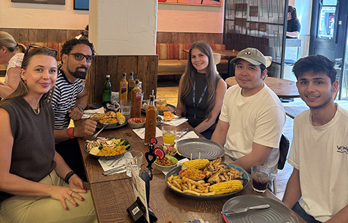 Emrise team at restaurant table