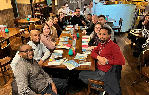 Emrise team at restaurant table